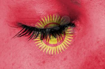 Crying woman, pain and grief concept, flag of Kyrgyzstan