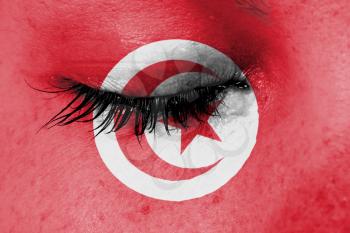 Crying woman, pain and grief concept, flag of Tunisia