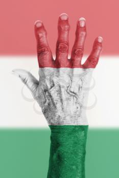 Isolated old hand with flag, European Union, Hungary