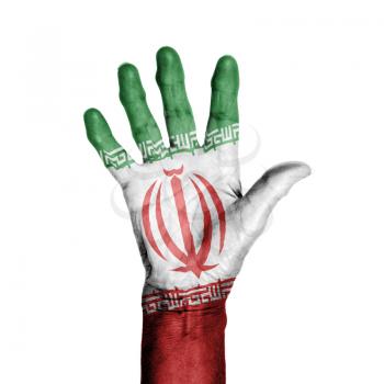 Hand of an old woman, wrapped with a pattern of the flag of Iran, isolated on white