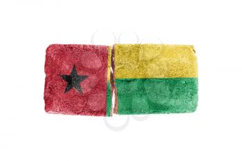 Rough broken brick, isolated on white background, flag of Guinea-Bissau