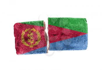 Rough broken brick, isolated on white background, flag of Eritrea