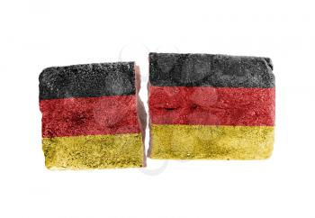 Rough broken brick, isolated on white background, flag of Germany