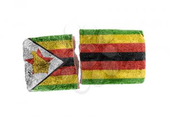 Rough broken brick, isolated on white background, flag of Zimbabwe