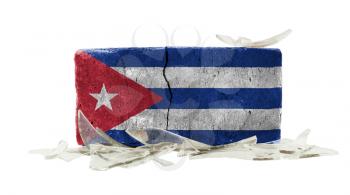 Brick with broken glass, violence concept, flag of Cuba
