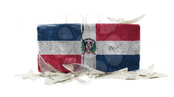 Brick with broken glass, violence concept, flag of the Dominican Republic