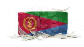 Brick with broken glass, violence concept, flag of Eritrea