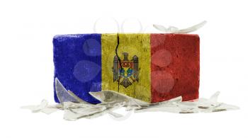Brick with broken glass, violence concept, flag of Moldova