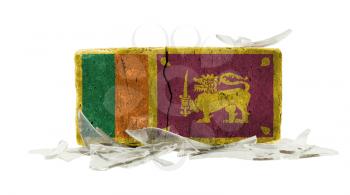 Brick with broken glass, violence concept, flag of Sri Lanka