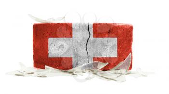 Brick with broken glass, violence concept, flag of Switzerland
