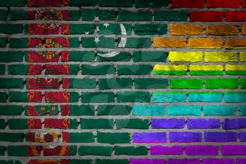 Dark brick wall texture - coutry flag and rainbow flag painted on wall - Turkmenistan