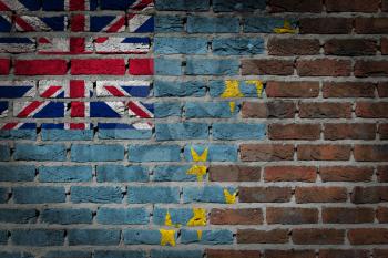 Very old dark red brick wall texture with flag - Tuvalu