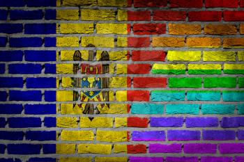 Dark brick wall texture - coutry flag and rainbow flag painted on wall - Moldova