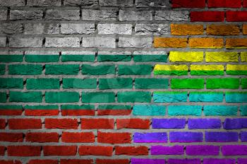 Dark brick wall texture - coutry flag and rainbow flag painted on wall - Bulgaria