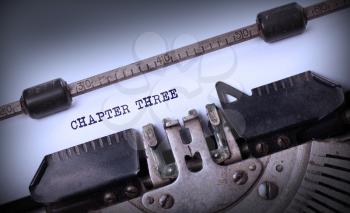 Vintage inscription made by old typewriter, Chapter three