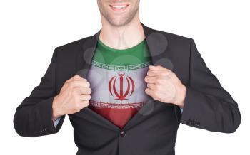 Businessman opening suit to reveal shirt with flag, Iran