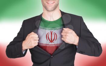 Businessman opening suit to reveal shirt with flag, Iran