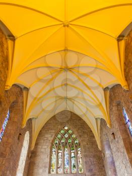 Dome of small Scottish cathedral, yellow lights