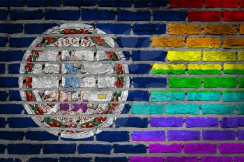 Dark brick wall texture - coutry flag and rainbow flag painted on wall - Virginia