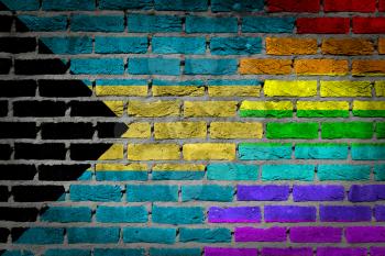 Dark brick wall texture - coutry flag and rainbow flag painted on wall - Bahamas