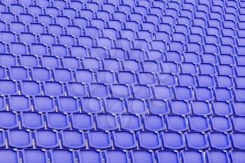 Blue seat in sport stadium, empty seats ready for the public