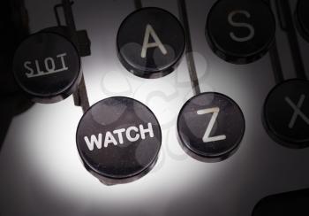 Typewriter with special buttons, watch