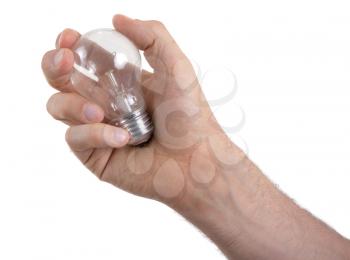 Hand holding an light bulb isolated on white background