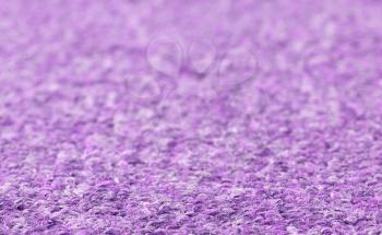 Carpet texture close-up, purple furry carpet texture background, selective focus