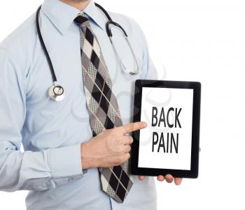 Doctor, isolated on white backgroun,  holding digital tablet - Back pain