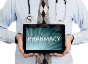 Doctor, isolated on white backgroun,  holding digital tablet - Pharmacy