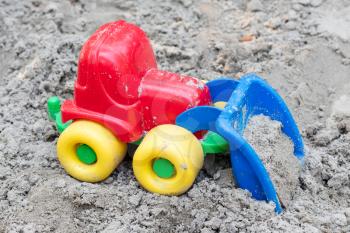 Children's machine in the sand, selective focus