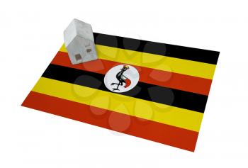 Small house on a flag - Living or migrating to Uganda