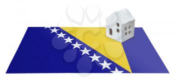 Small house on a flag - Living or migrating to Bosnia Herzegovina