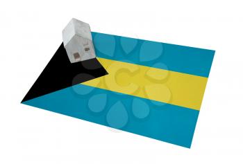 Small house on a flag - Living or migrating to Bahamas