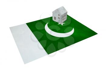 Small house on a flag - Living or migrating to Pakistan
