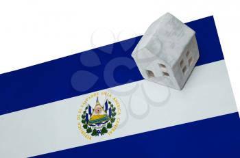 Small house on a flag - Living or migrating to El Salvador
