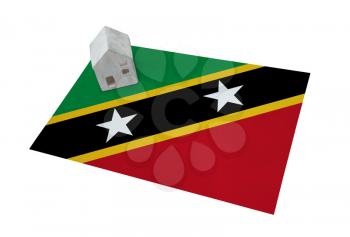 Small house on a flag - Living or migrating to Saint Kitts and Nevis