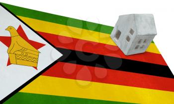 Small house on a flag - Living or migrating to Zimbabwe
