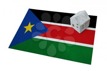 Small house on a flag - Living or migrating to South Sudan