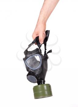 Man holding vintage gasmask isolated on white background - Green filter