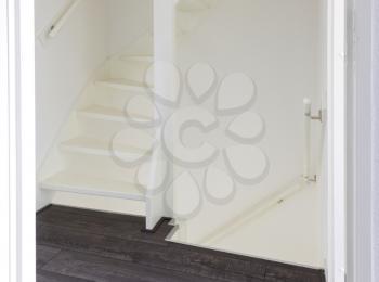 White wooden stairs - Going from upstairs to downstairs