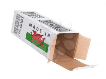 Concept of export, opened paper box - Product of Wales