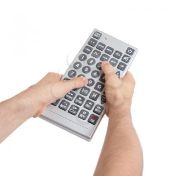 Media conceptual image - Unusual large remote control, isolated on white