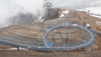 LES DIABLERETS, SWITZERLAND - July 22, 2015 Europe's highest toboggan run in the Swiss mountains on July 22, 2015.