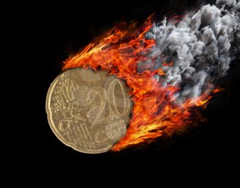 Burning coin with a trail of fire and smoke - 20 eurocent