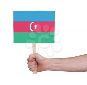 Hand holding small card, isolated on white - Flag of Azerbaijan