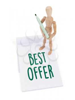 Wooden mannequin writing in a scrapbook - Best offer