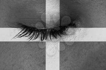 Women eye, close-up, tear, flag of Cornwall