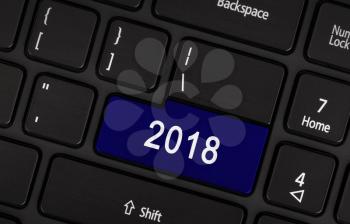 Laptop keyboard with a blue button 2018