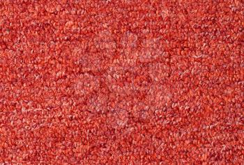Carpet texture close-up, red furry carpet texture background
